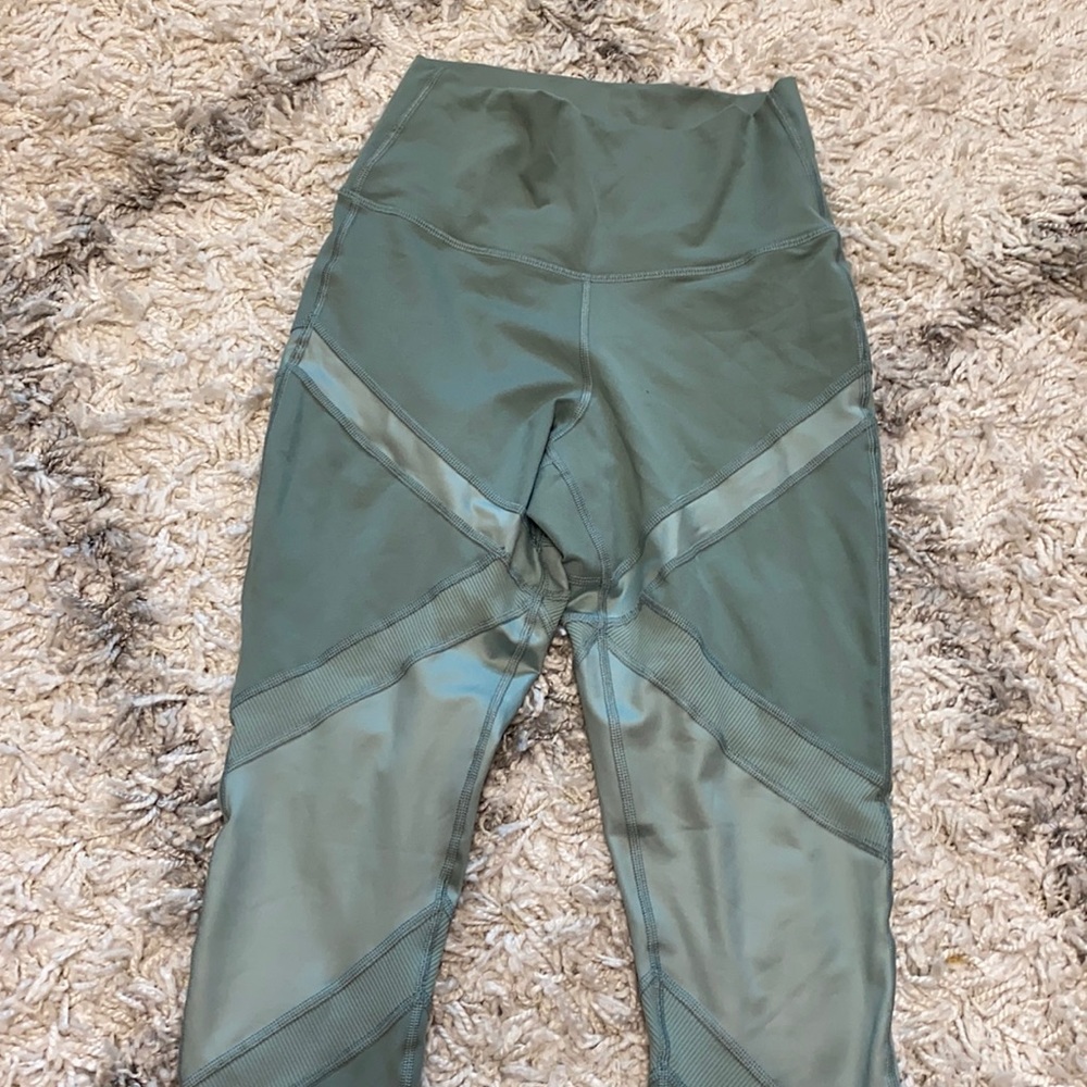 Green leggings